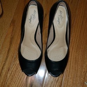 Used black and straw peep toe wedges
